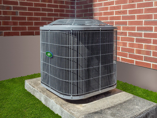 A new air conditioner unit sitting outside of a home with brick walls